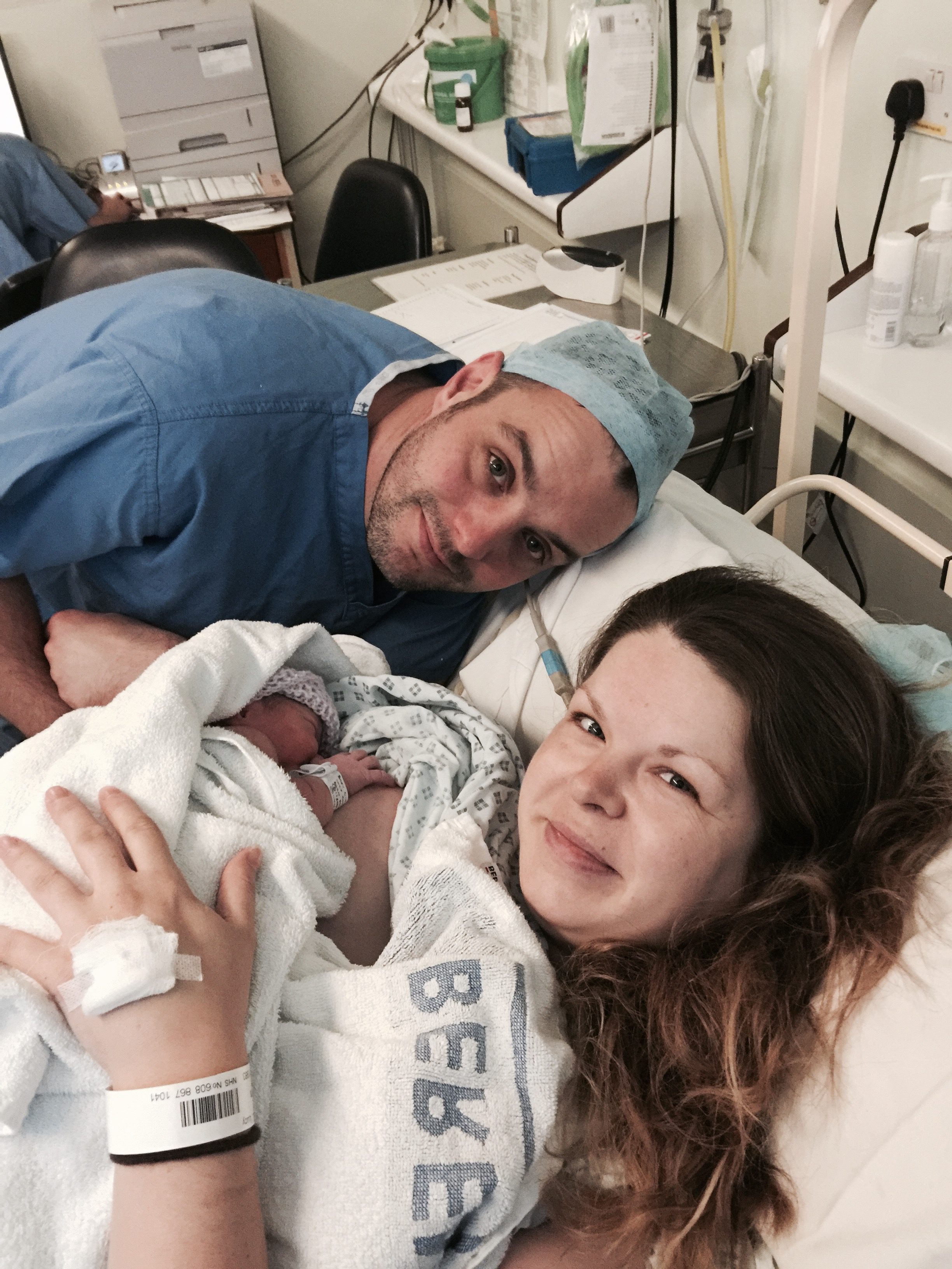 Couple welcoming baby after caesarean / c-section birth
